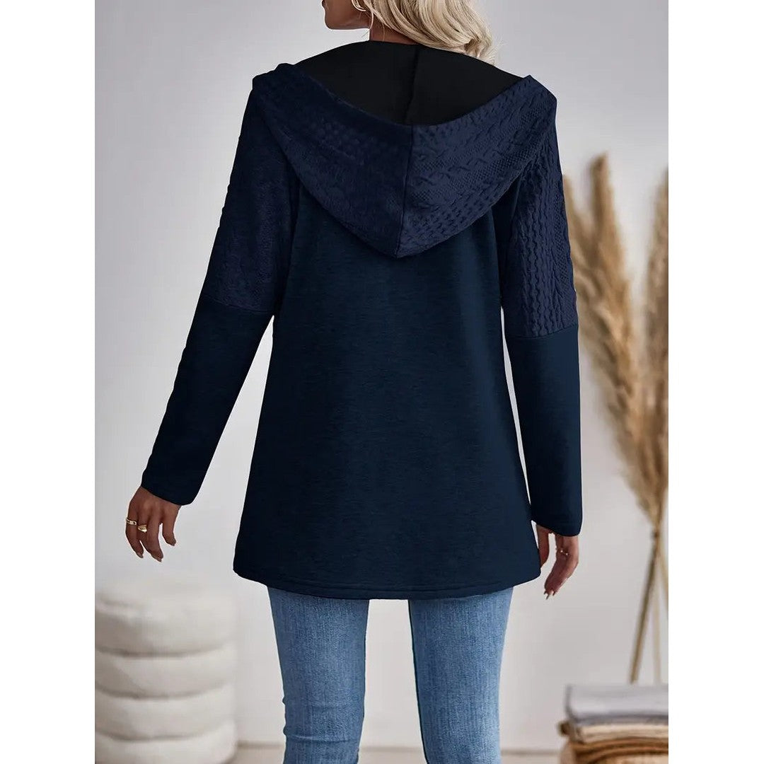 Woman wearing the Ines women's hooded zip-up sweatshirt, back view