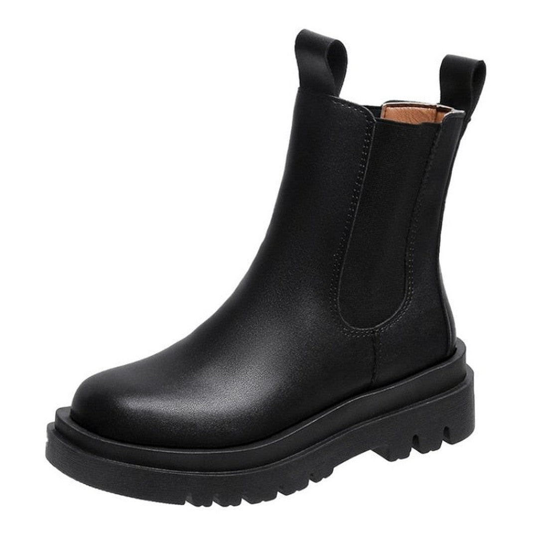 Woman wearing the Ingrid women's boots, side view