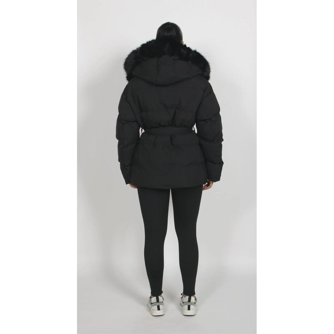 Woman wearing the Iris women's jacket in black, back view