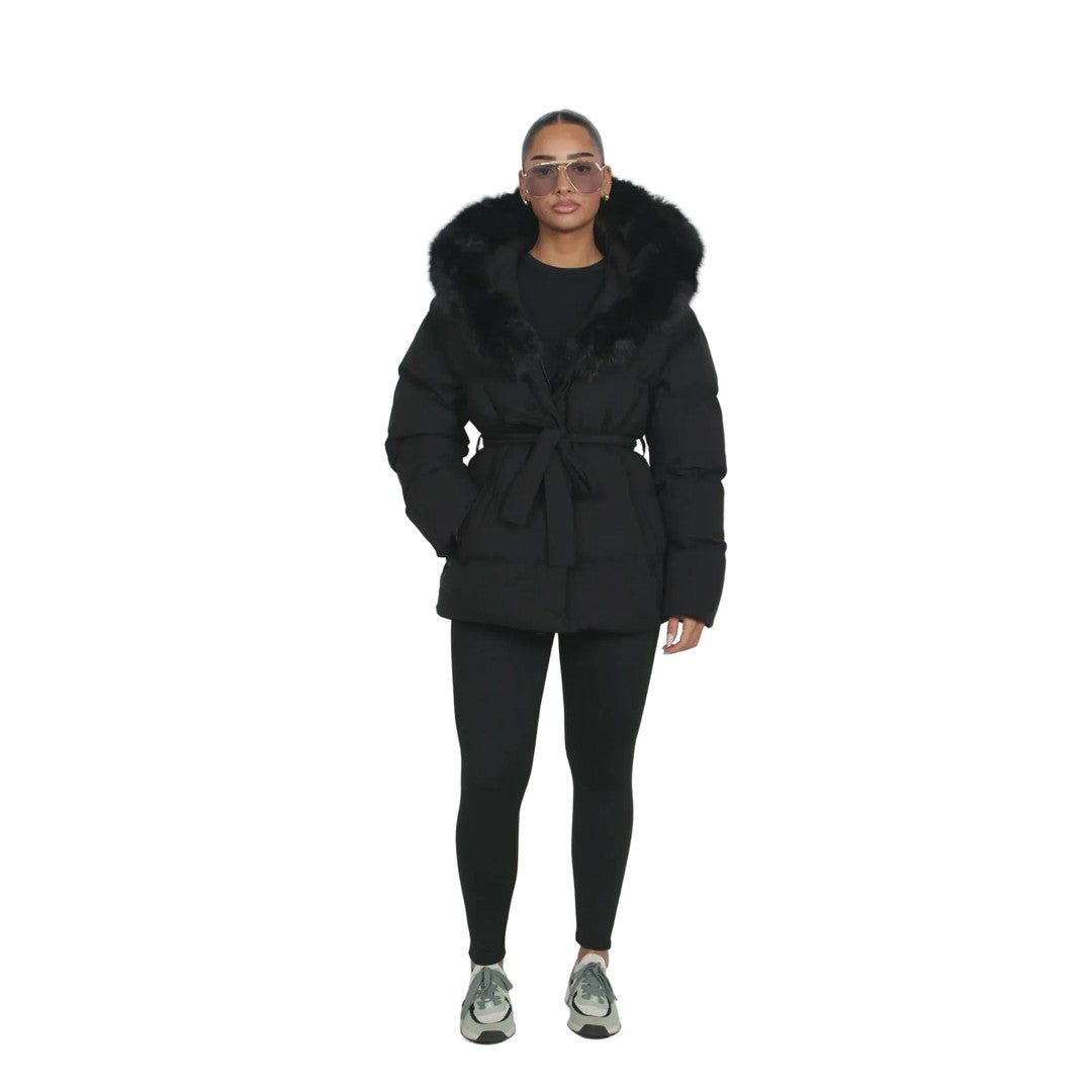 Woman wearing the Iris women's jacket in black, front view