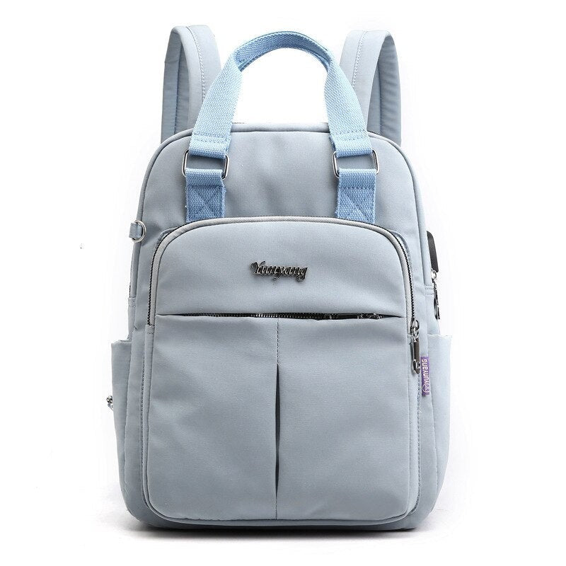 Water-resistant anti-theft backpack with a USB charging port - product photo 5