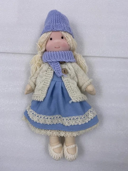 Handmade Waldorf soft doll with knitted clothes - product photo 1