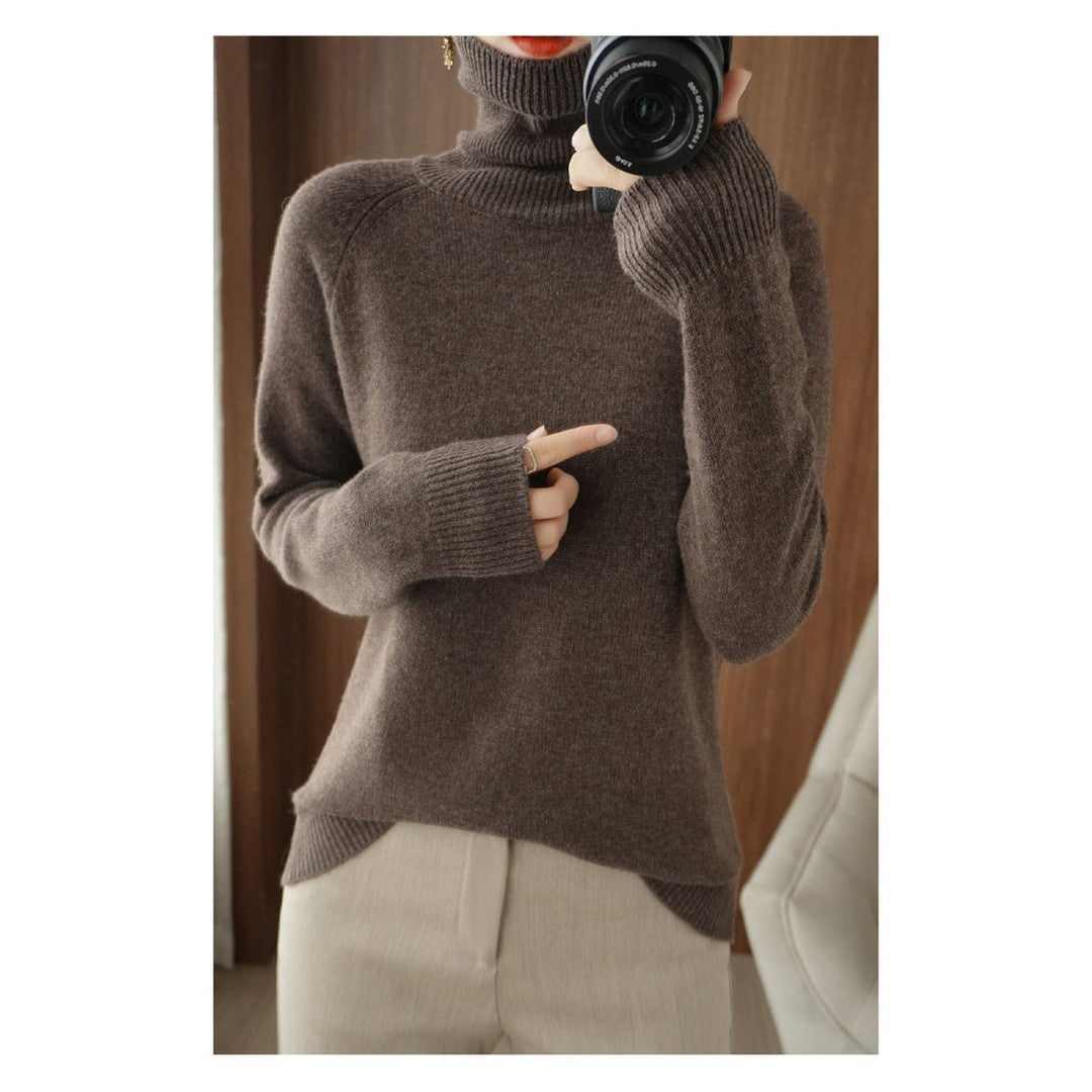 Woman wearing the Lark women's knit sweater, back view