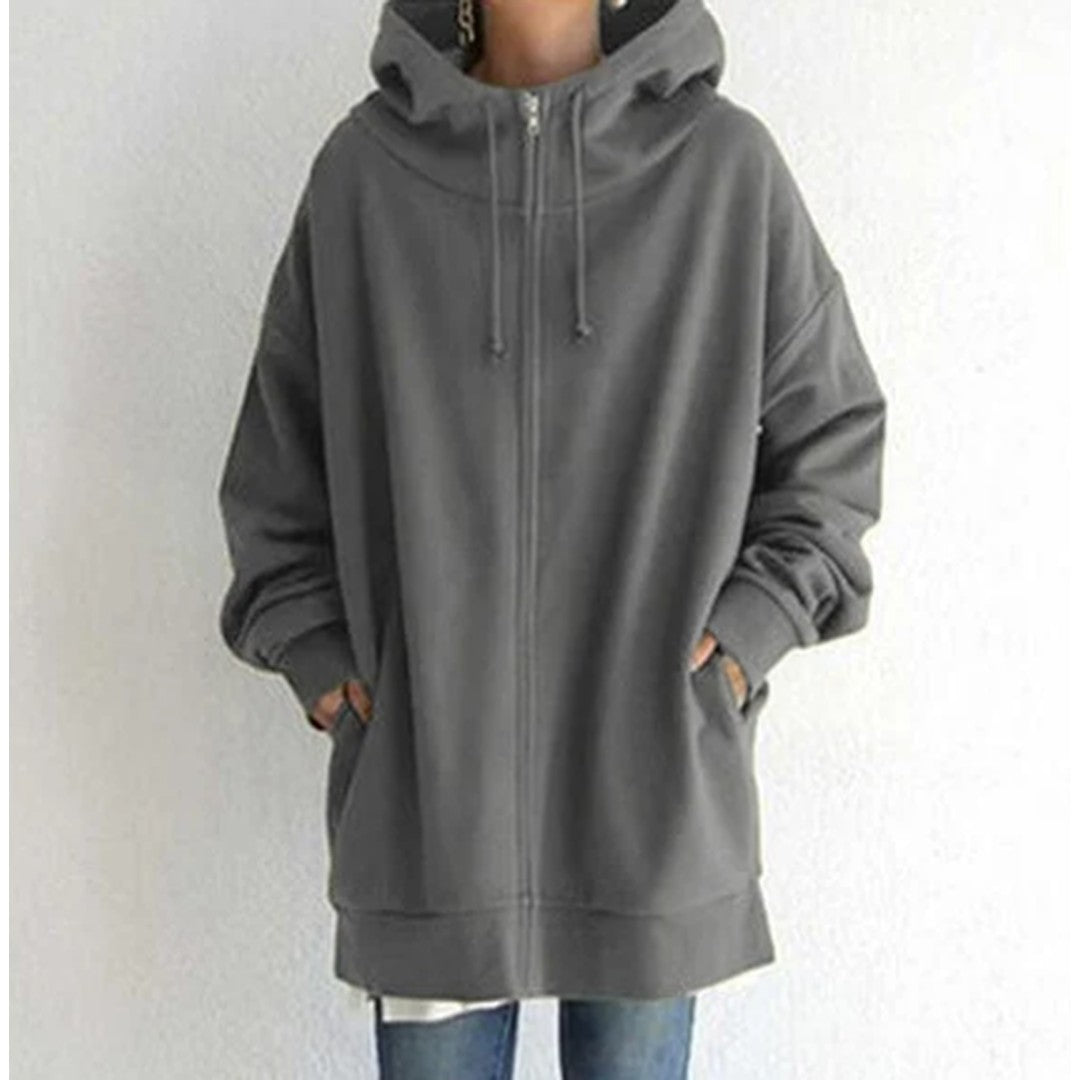Woman wearing the Lenore women's zip-up hoodie, flatlay view