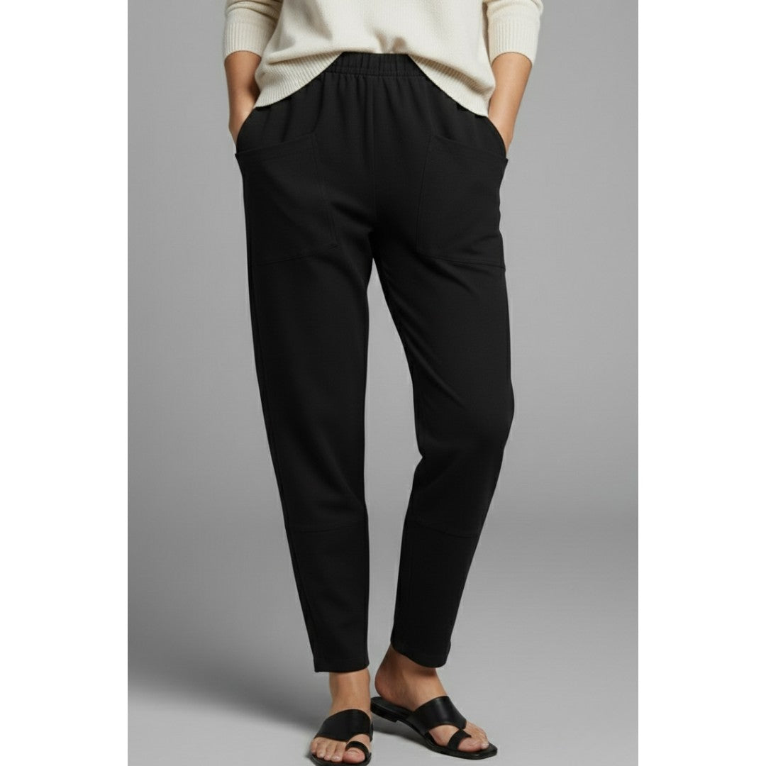 Woman wearing the Lilith women's pocket detail pants, detail view