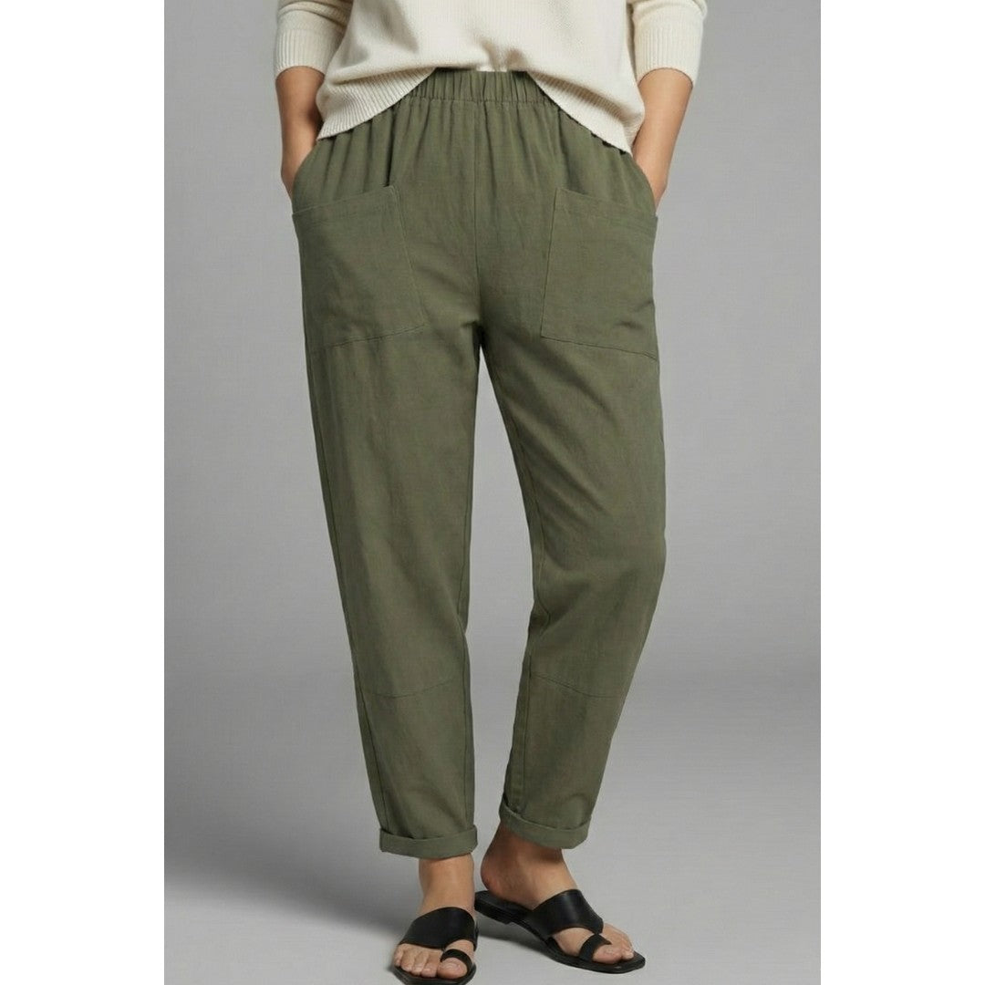 Woman wearing the Lilith women's pocket detail pants, flatlay view