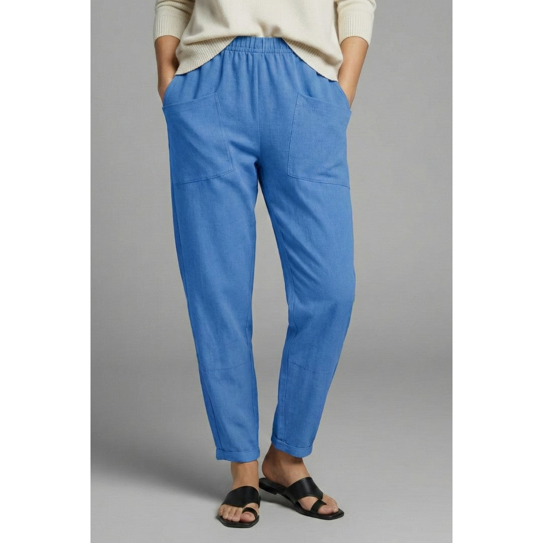 Woman wearing the Lilith women's pocket detail pants, side view