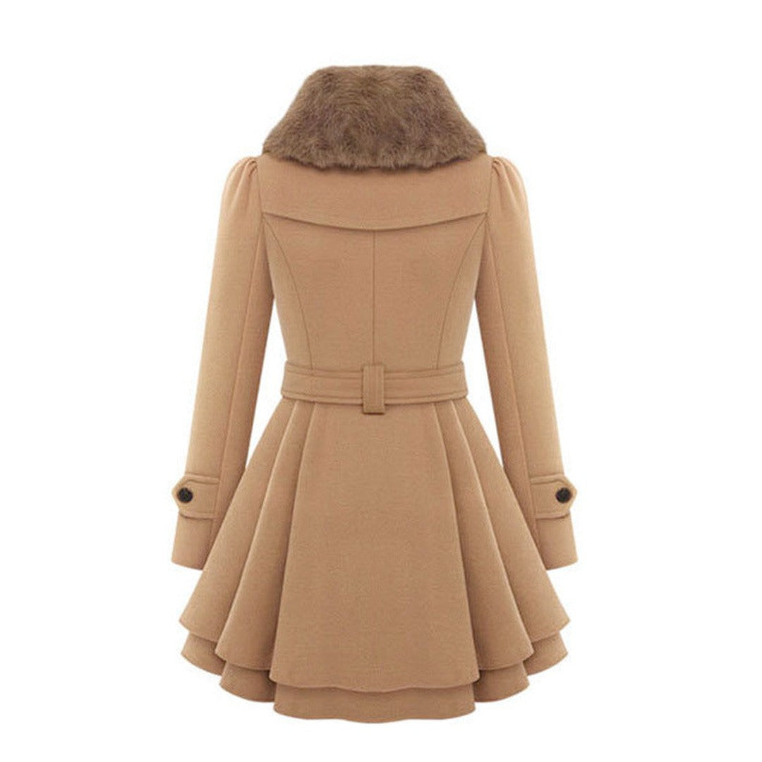 Woman wearing the Lily women's vintage trench coat, side view