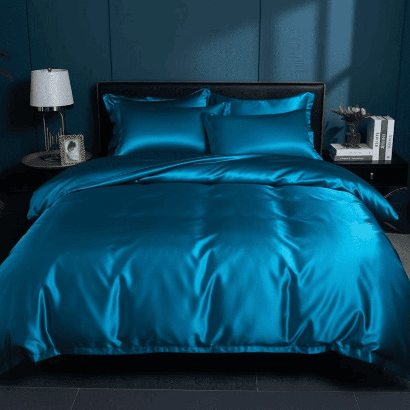 Satin bedding set on a made bed - product photo 1