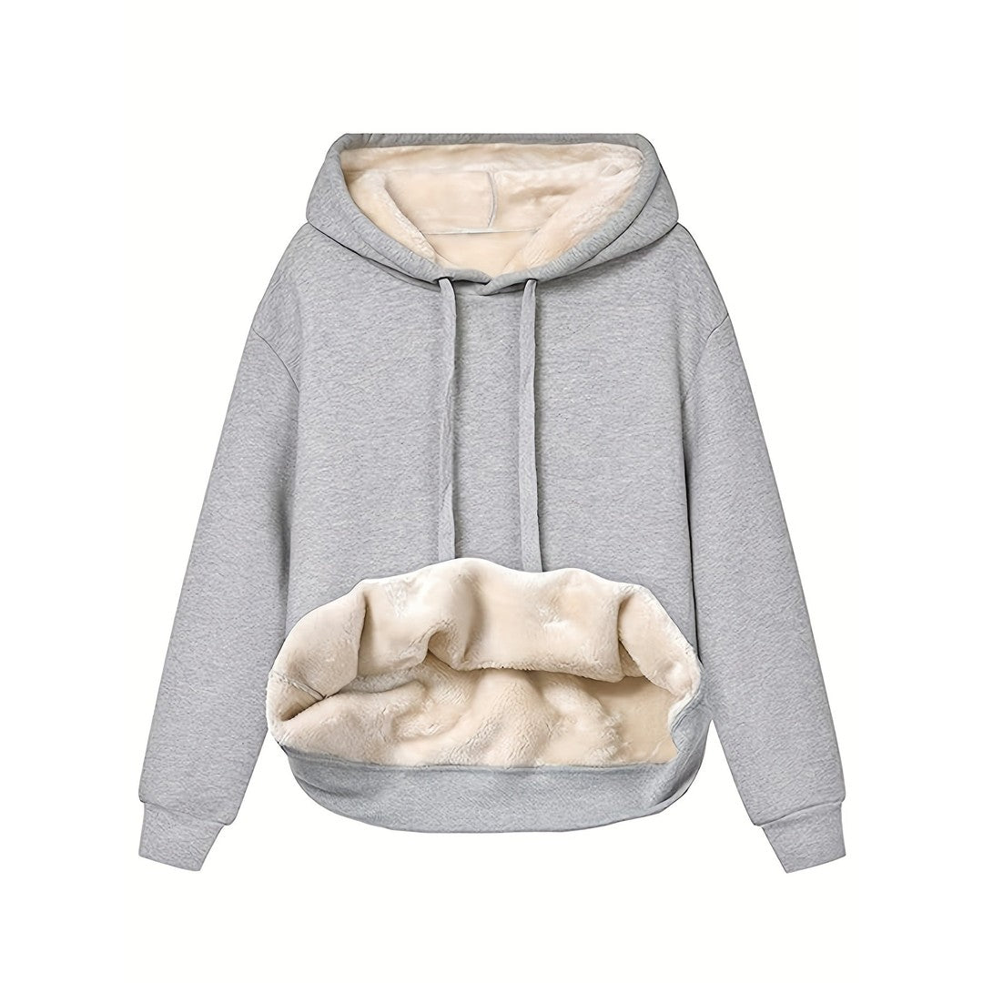 Woman wearing the Maeve women's fleece hoodie, side view