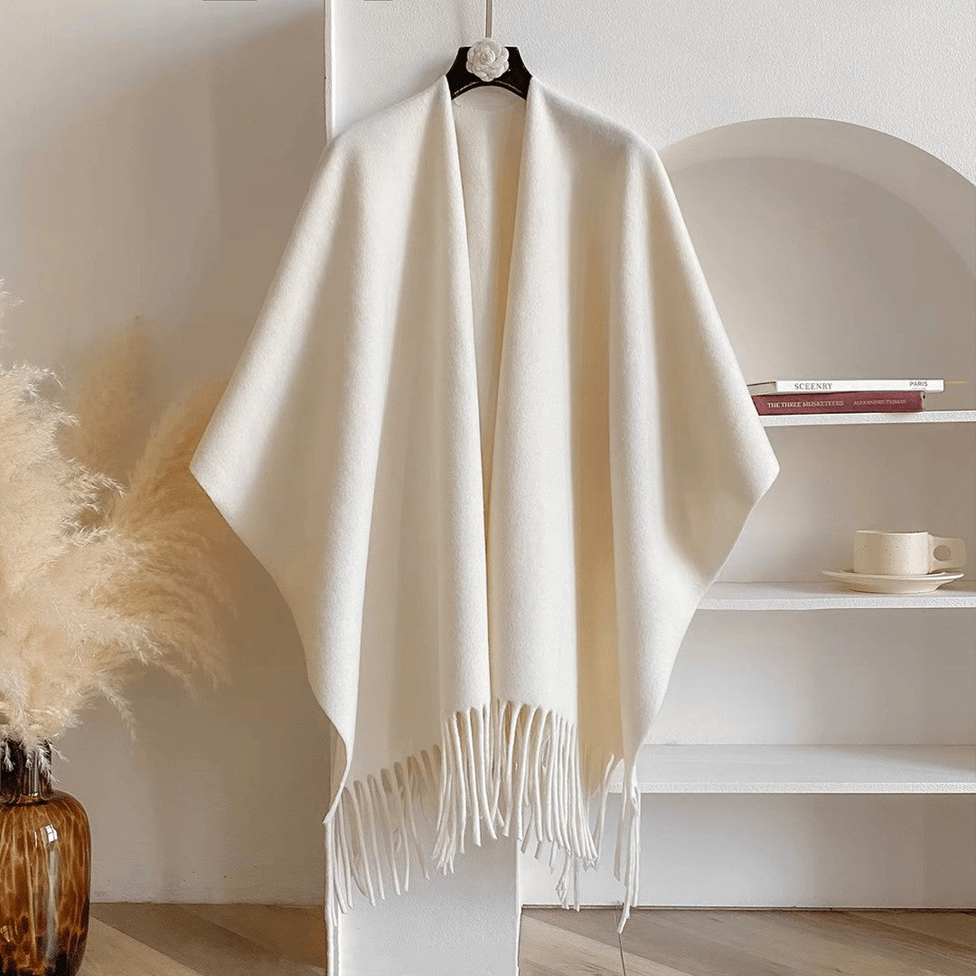 Woman wearing the Marcella women's poncho, front view