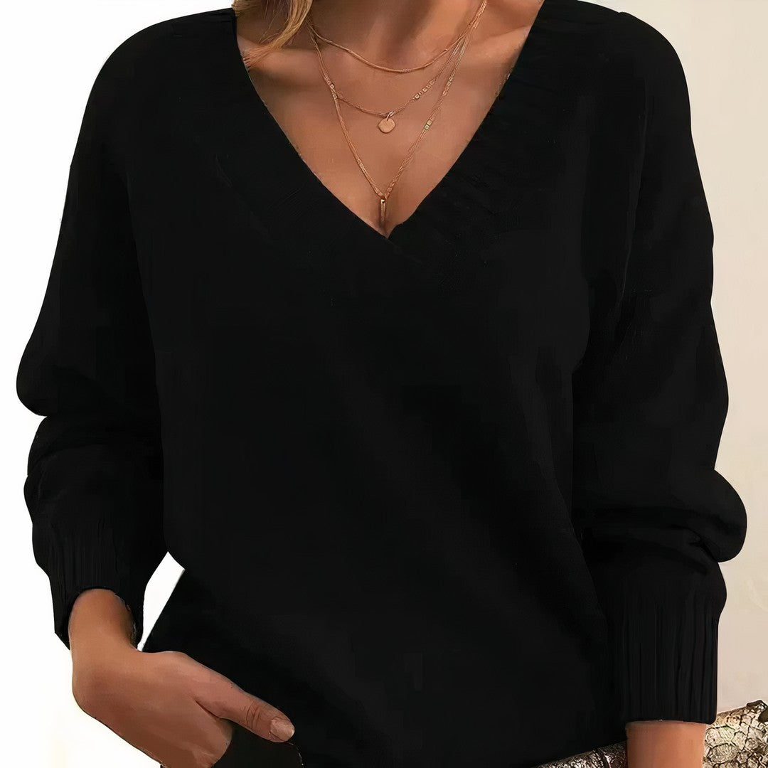Woman wearing the Mavis women's v-neck long-sleeve sweater, flatlay view