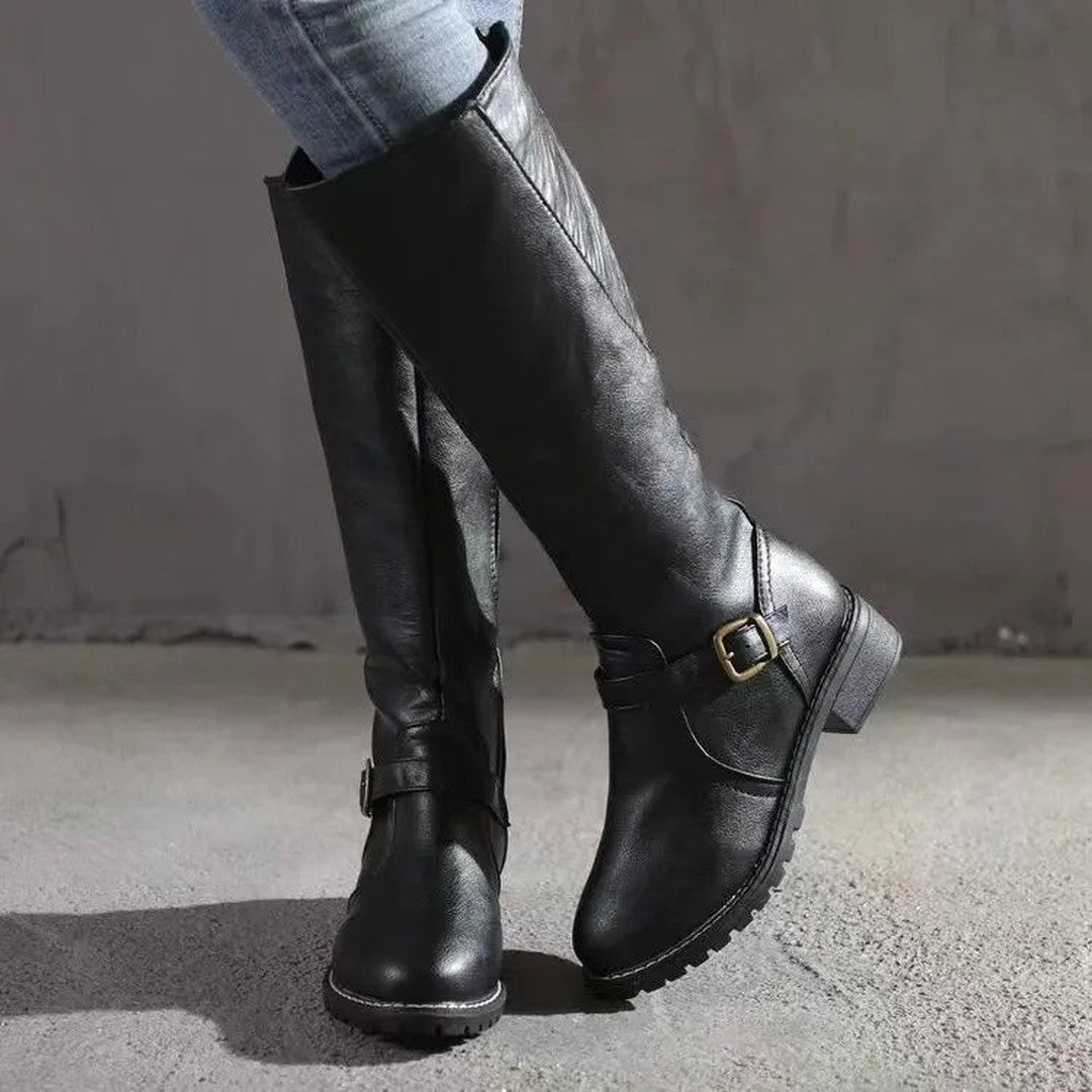 Woman wearing the Melisande women's classic boots, front view