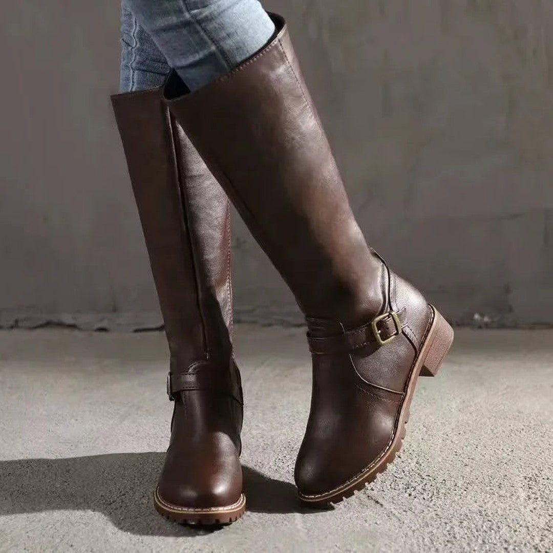Woman wearing the Melisande women's classic boots, side view
