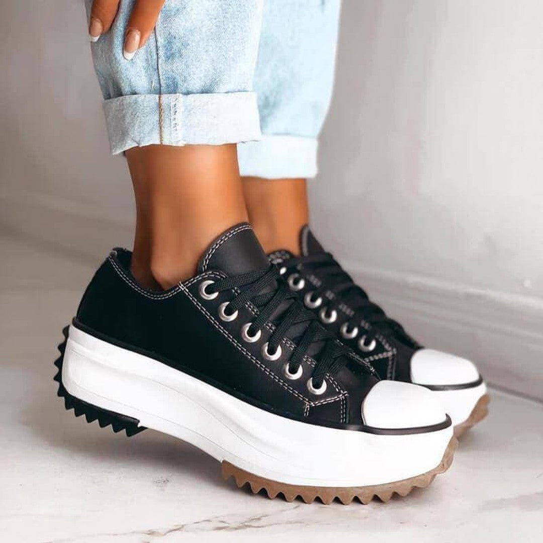 Woman wearing the Mila women's sneakers, back view