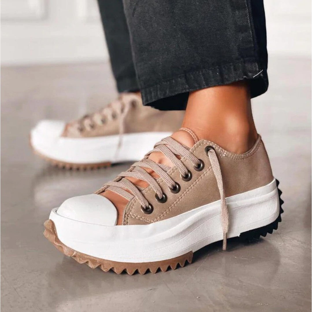 Woman wearing the Mila women's sneakers, flatlay view