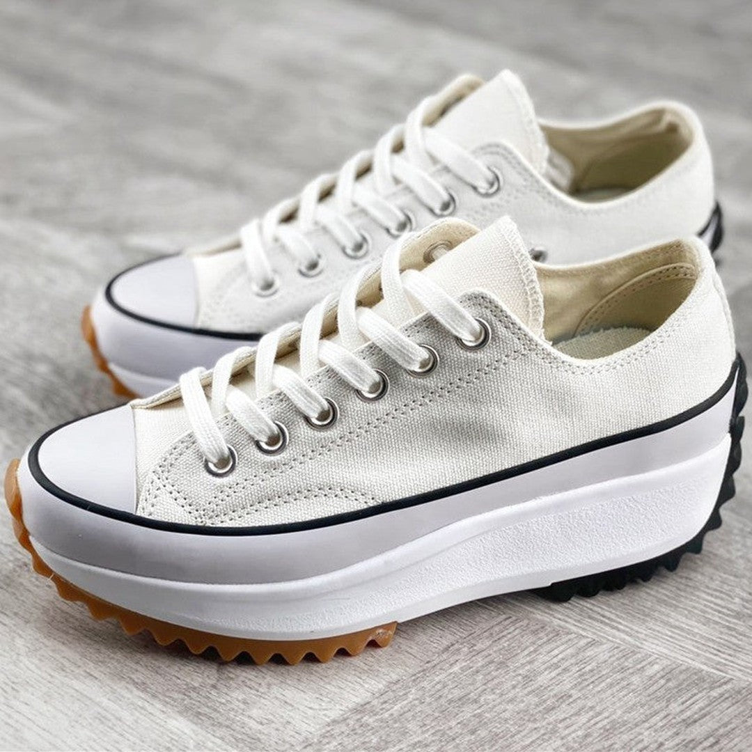 Woman wearing the Mila women's sneakers, model view