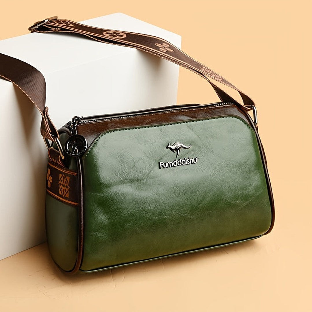 Woman wearing the Mira women's leather pocket detail bag, 10 view