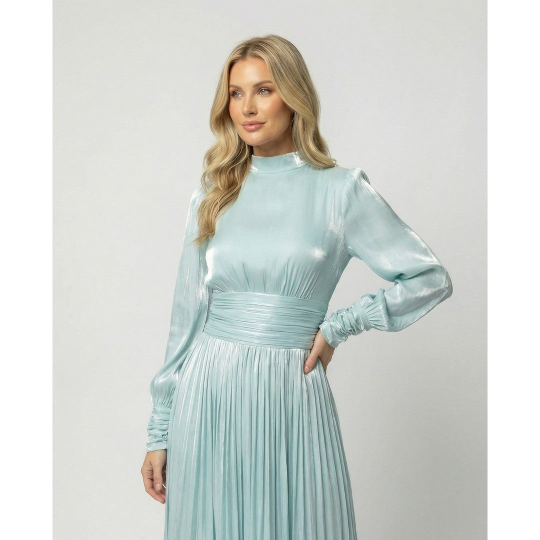 Woman wearing the Moira women's maxi dress, side view