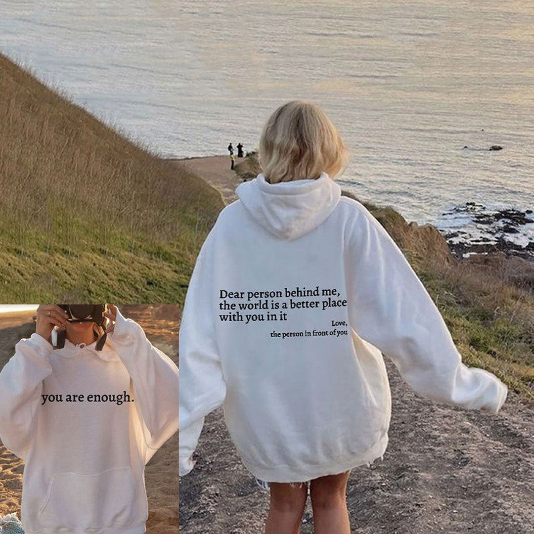 Woman wearing the Naomi women's hoodie, flatlay view