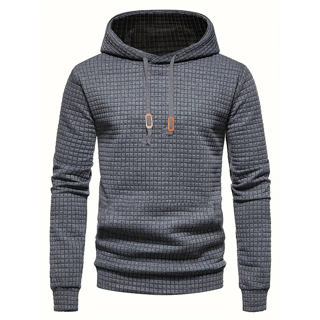 Man wearing the Nikolai men's casual hooded streetwear sweatshirt, flatlay view