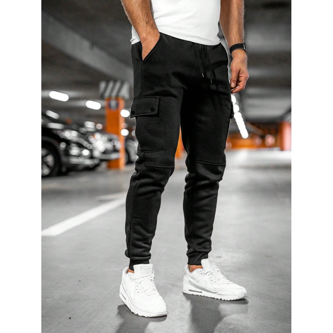 Man wearing the Nolan men's roll-up joggers, model view