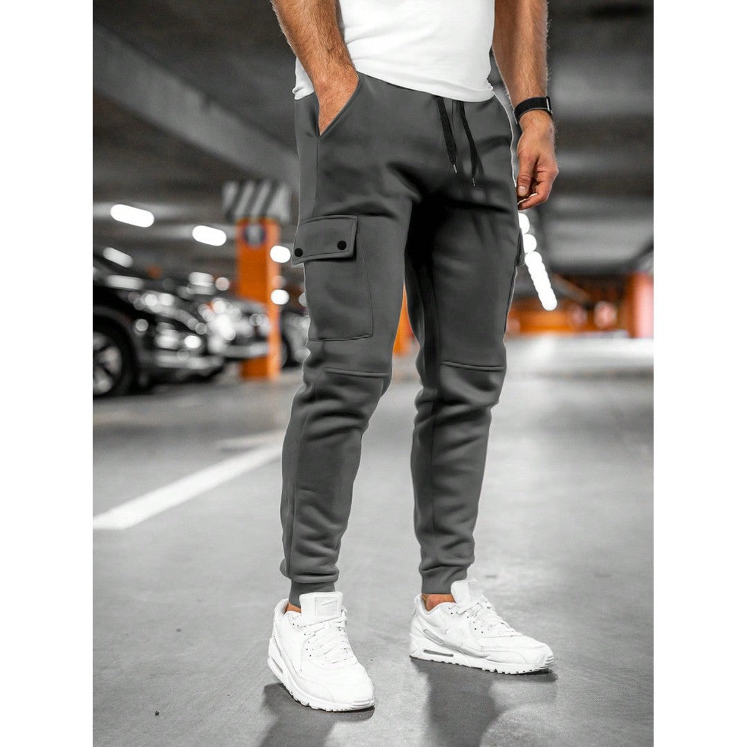 Man wearing the Nolan men's roll-up joggers, side view