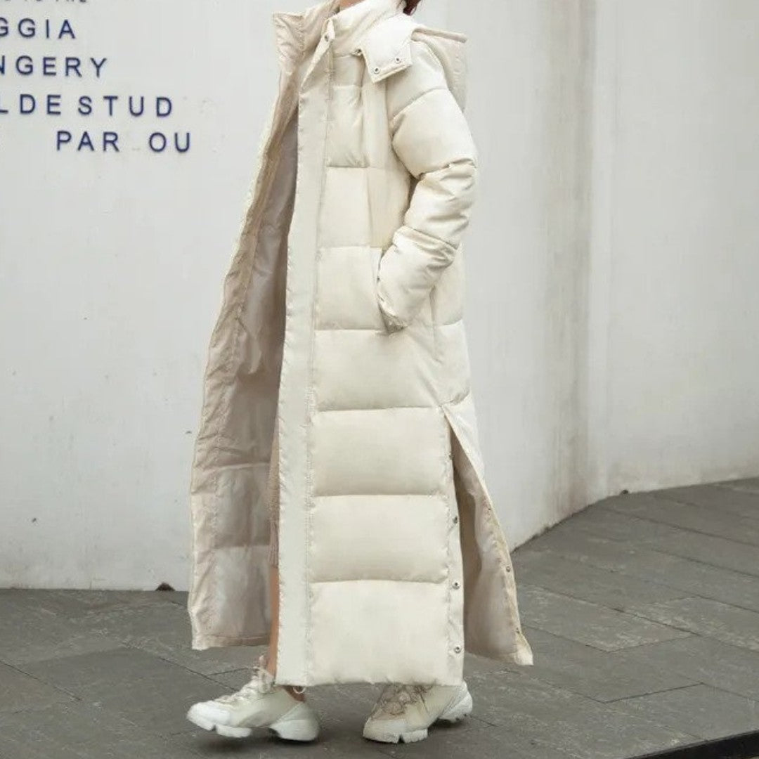 Woman wearing the Nora women's long-sleeve coat, back view