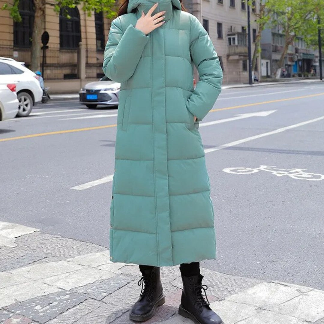 Woman wearing the Nora women's long-sleeve coat, detail view