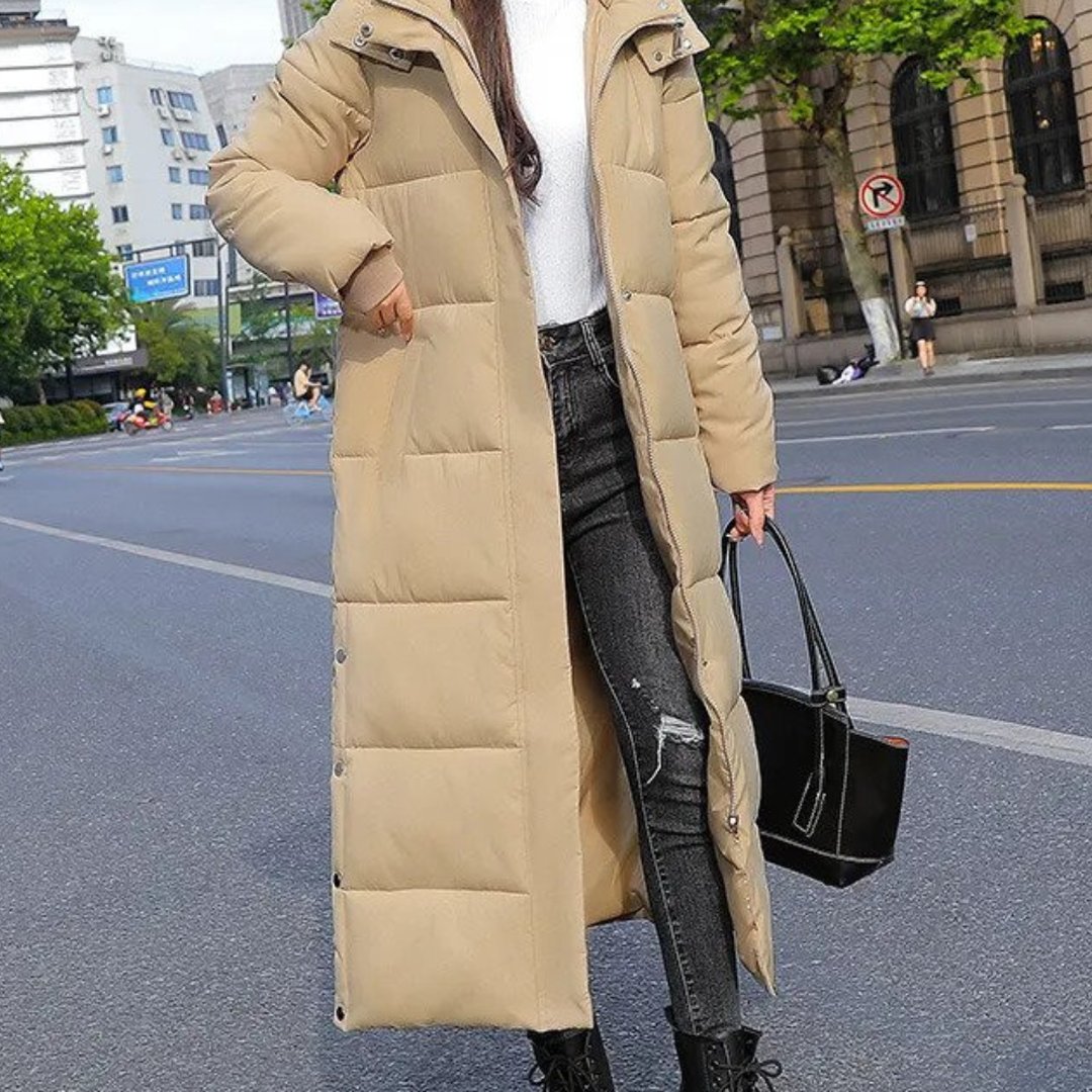 Woman wearing the Nora women's long-sleeve coat, front view