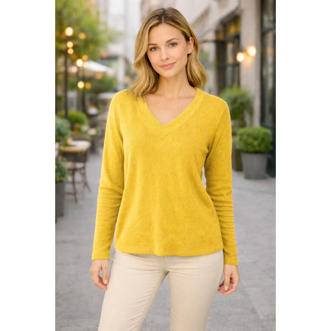 Woman wearing the Norah women's v-neck knit vintage sweater, 8 view