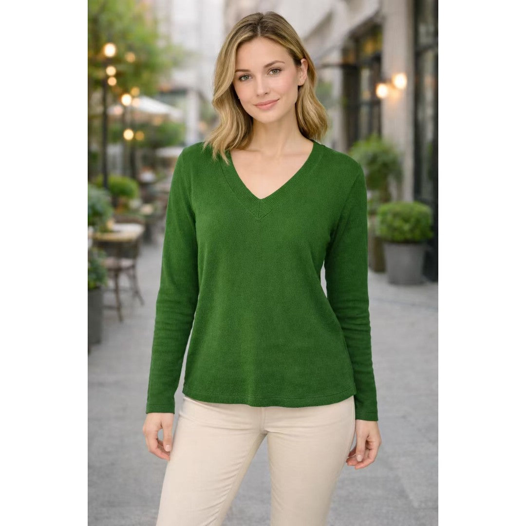 Woman wearing the Norah women's v-neck knit vintage sweater, back view
