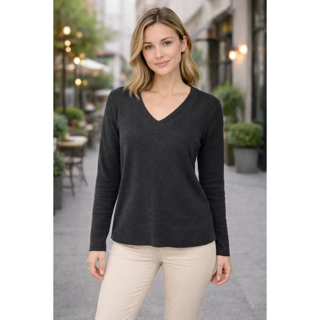 Woman wearing the Norah women's v-neck knit vintage sweater, front view