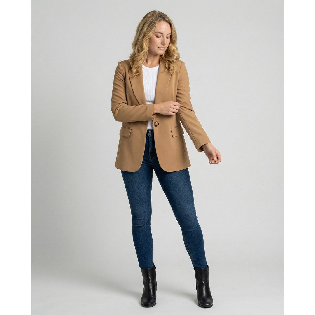 Woman wearing the Ophelia women's elegant blazer, back view