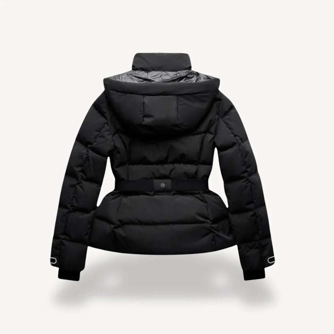 Woman wearing the Paloma women's hooded quilted jacket in black, back view