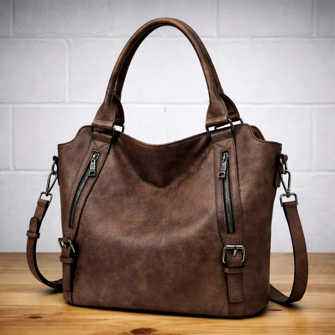Woman wearing the Paulina women's elegant bag, side view