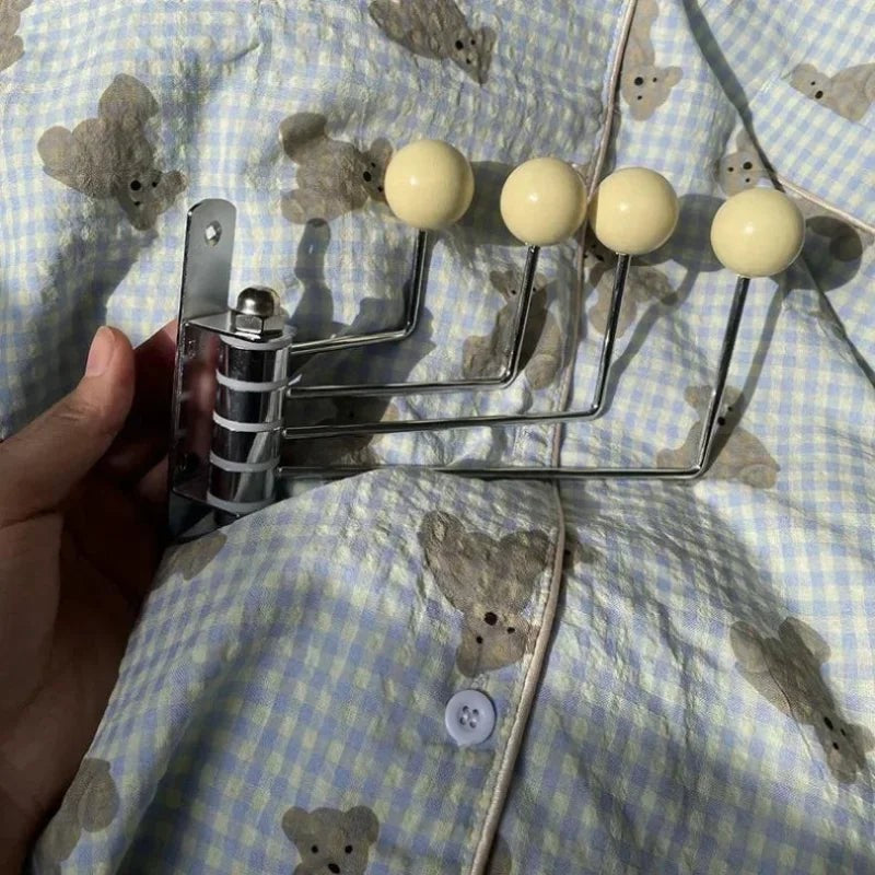Metal wall coat rack with round knobs - product photo 18