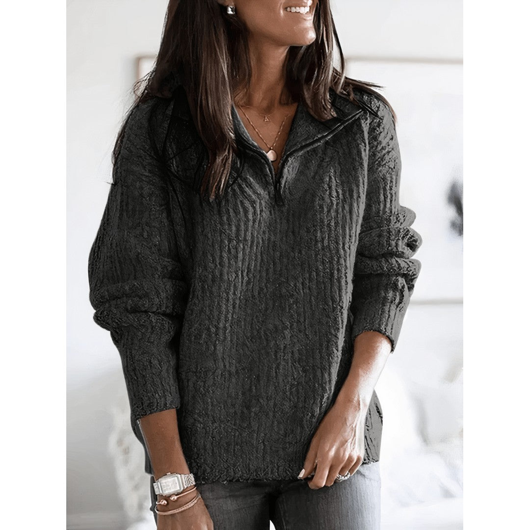 Woman wearing the Peyton women's elegant sweater, side view