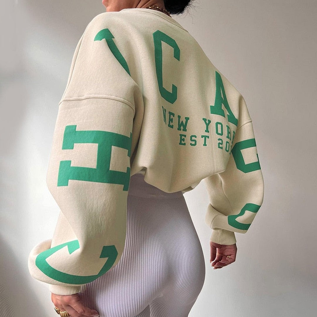 Woman wearing the Priya women's hooded sweater in beige, 11 view