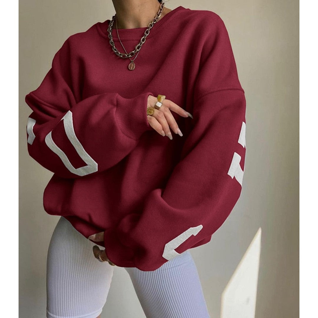 Woman wearing the Priya women's hooded sweater in beige, detail view