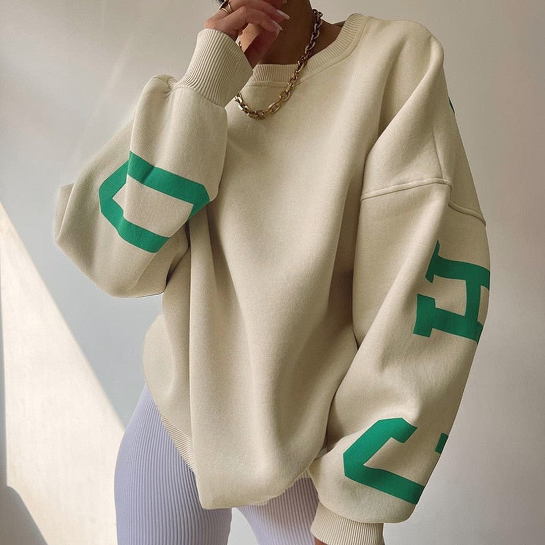 Woman wearing the Priya women's hooded sweater in beige, front view