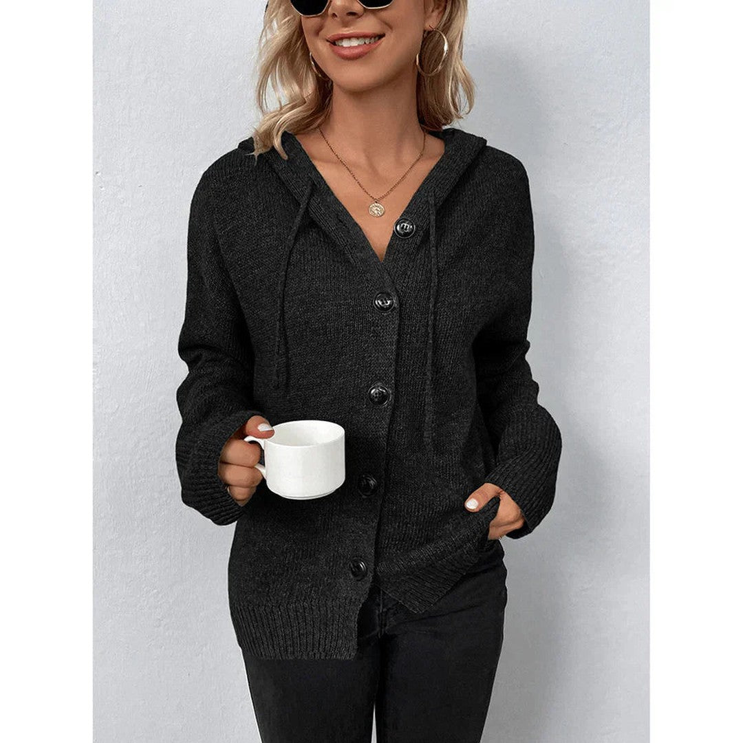 Woman wearing the Quinn women's hooded long-sleeve sweater, side view
