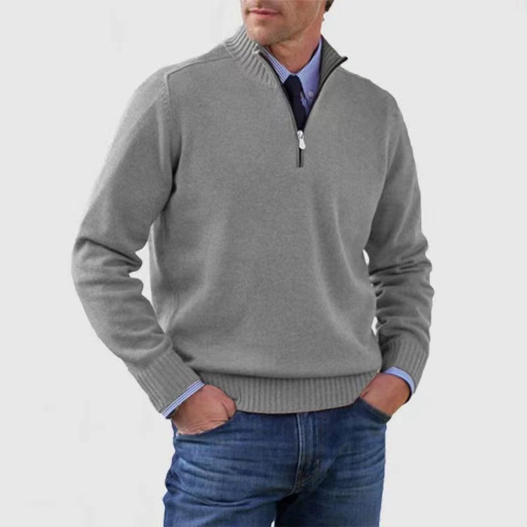 Man wearing the Rhys men's zip-up sweater, back view
