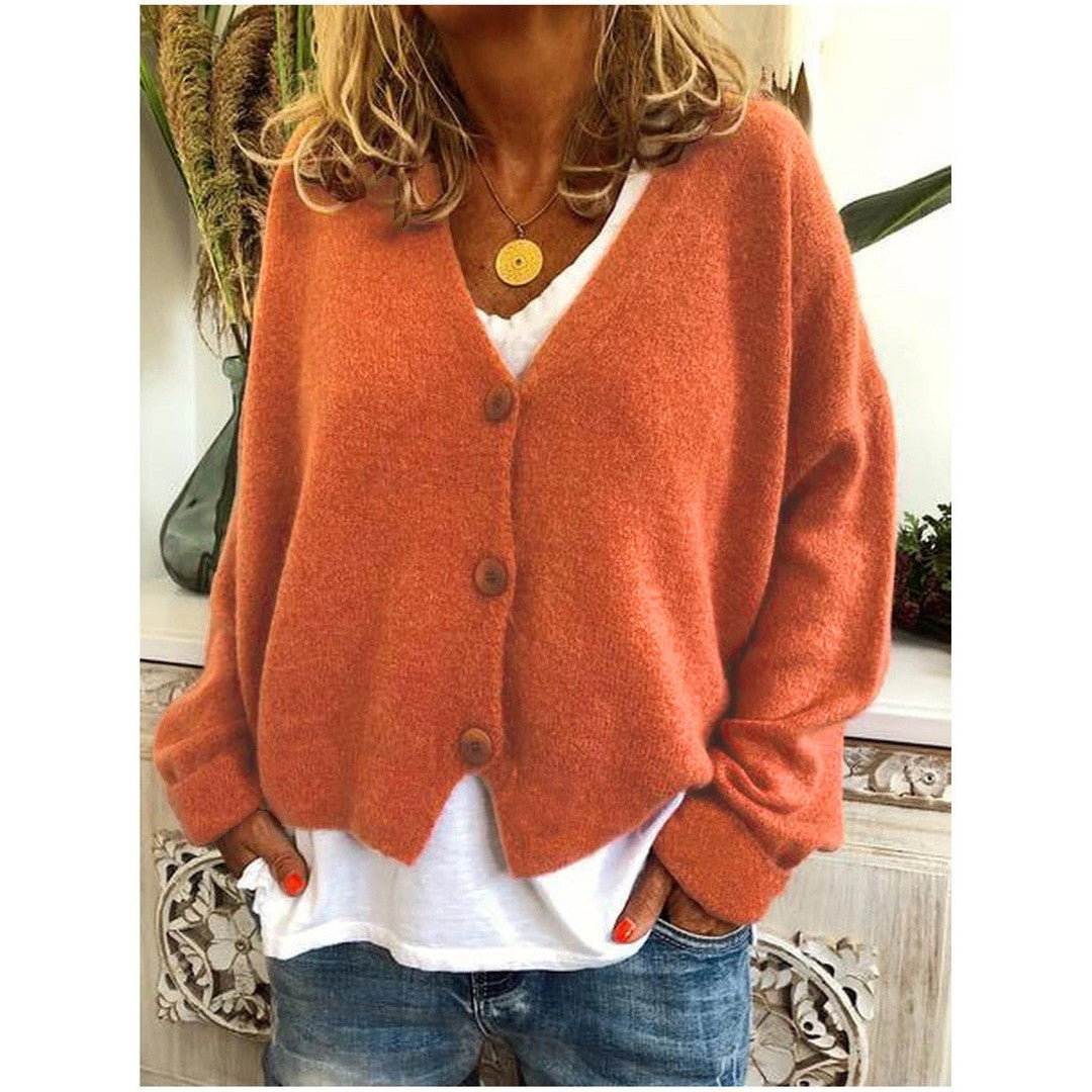 Woman wearing the Riley women's knit cardigan, front view
