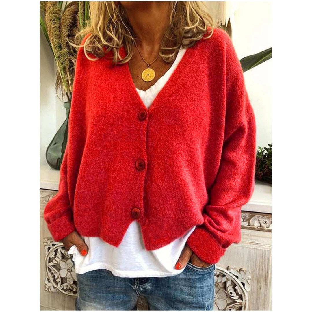 Woman wearing the Riley women's knit cardigan, side view