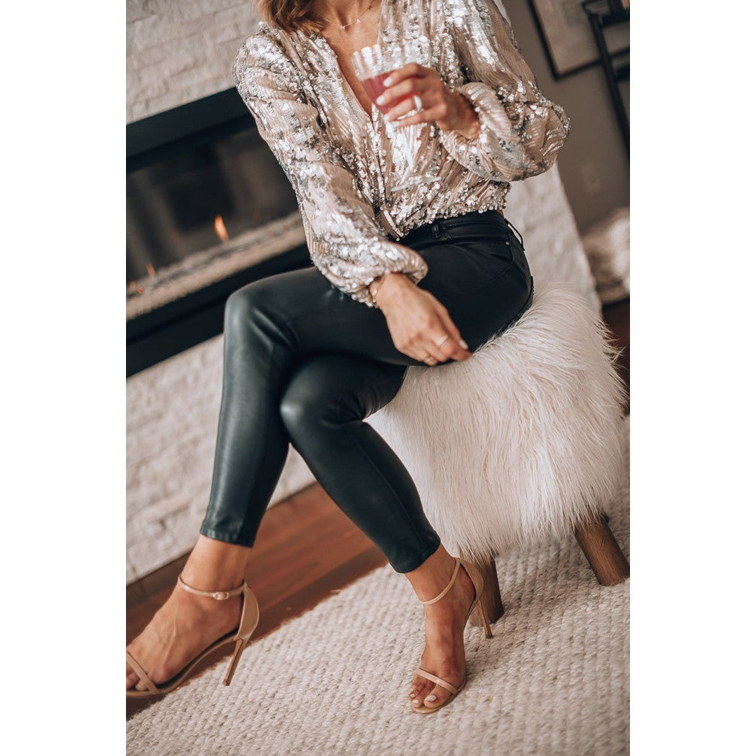 Woman wearing the Rowena women's long-sleeve blouse, model view