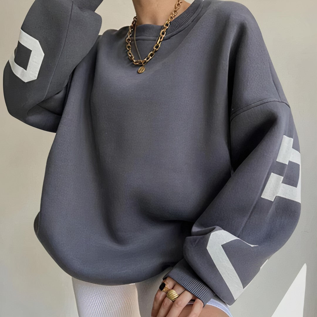 Woman wearing the Roxana women's crewneck long-sleeve sweatshirt, detail view