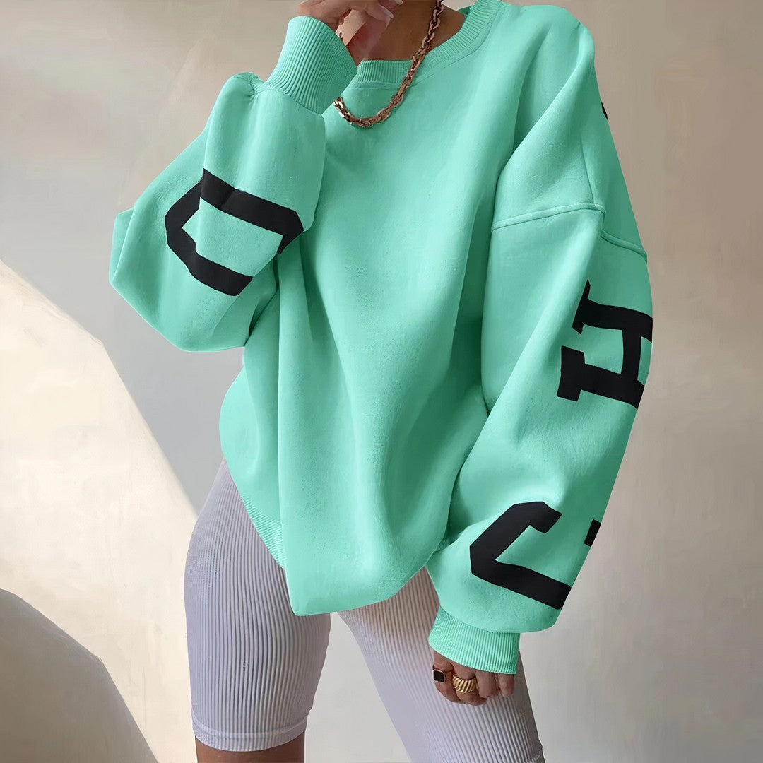 Woman wearing the Roxana women's crewneck long-sleeve sweatshirt, side view