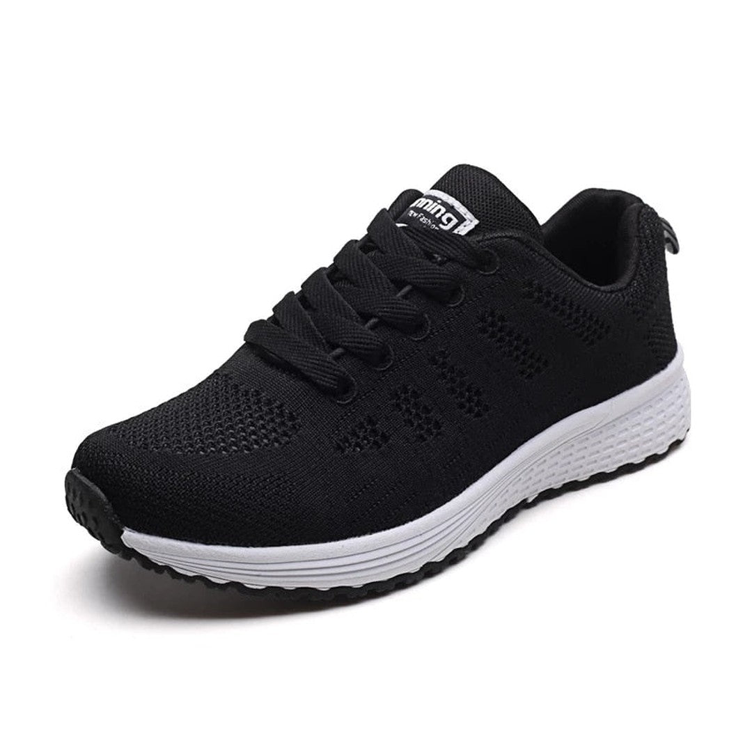 Woman wearing the Runa women's casual shoes, side view