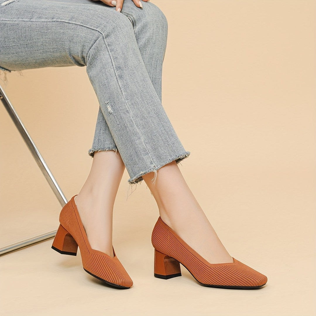 Woman wearing the Ryder women's pumps, model view